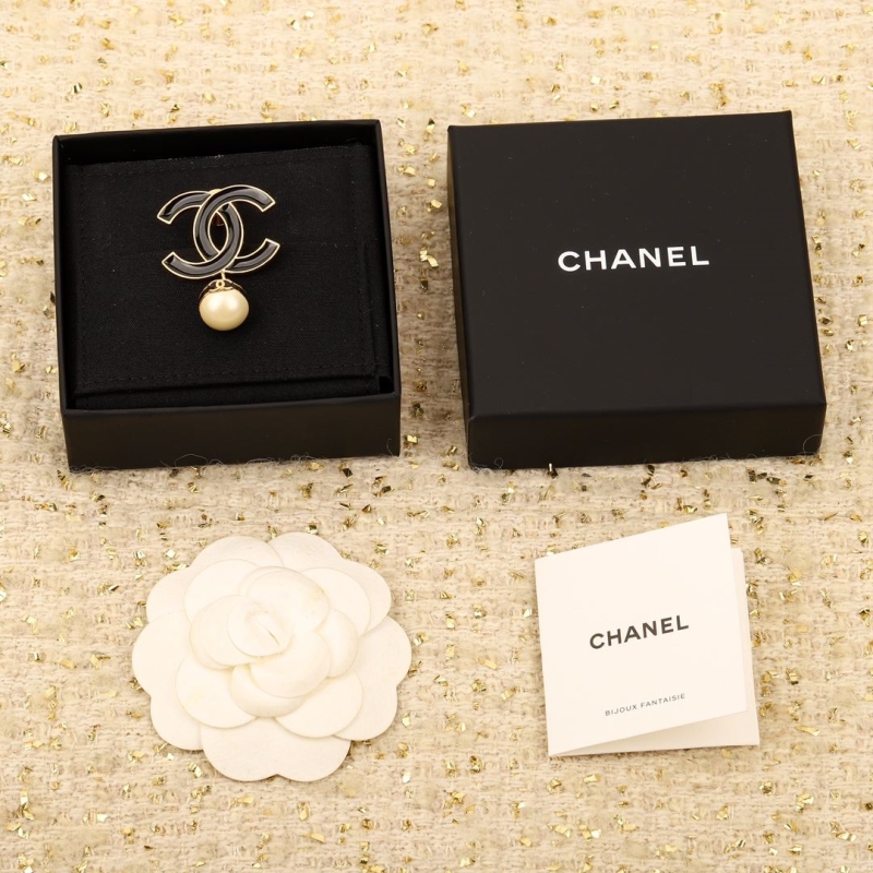 Ch*el brooches